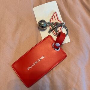 Glossier Luggage Tag